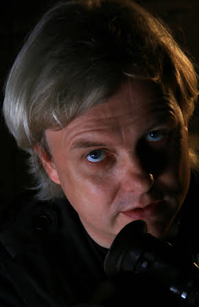 Paul Spurrier as Director