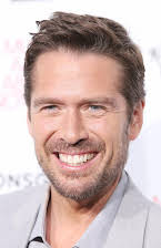Alexis Denisof som 