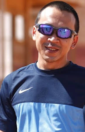 Wych Kaosayananda as Director