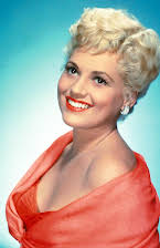 Judy Holliday as 