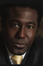 E. Roger Mitchell as 