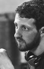 Max Isaacson as Director