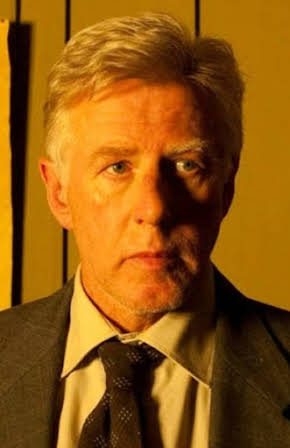 Phil Davis as 