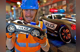 Handyman Hal: Handyman Hal builds a Police Car at Ridemakerz | RC Car for kids | Remote Police Car Racing