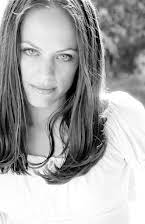 Mackenzie Firgens as 