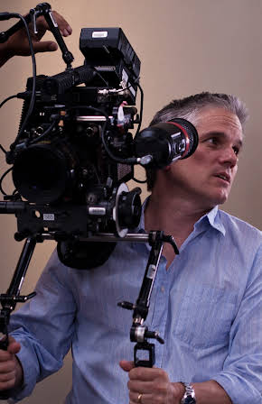 Brian Brightly as Director