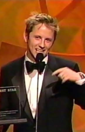 Gordon Michael Woolvett as 