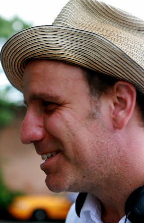 Nick Sandow as 