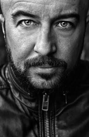 Mani Maserrat as Director
