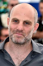 Eran Kolirin as Director