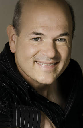 Larry Miller as 