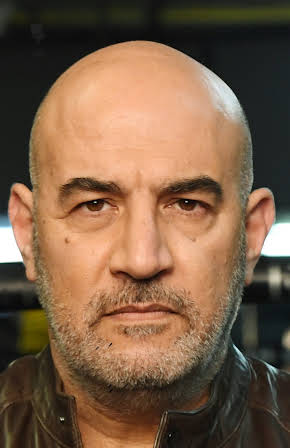 Yigal Naor as 