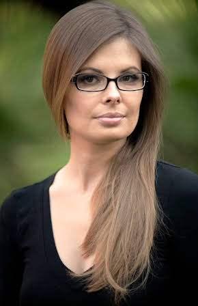 Anastazja Davis as Director