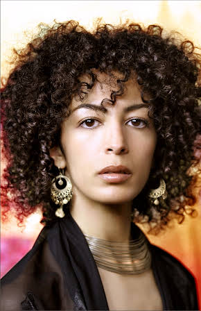 Nadia Kibout as 