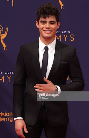 Emery Kelly as 