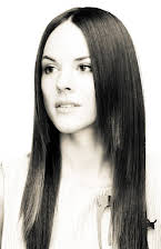 Sarah Butler as 