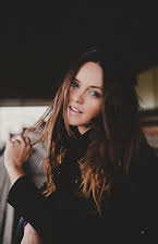 Rebecca Breeds as 