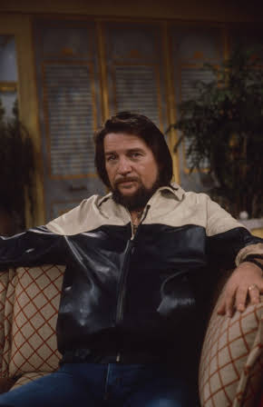 Waylon Jennings as 