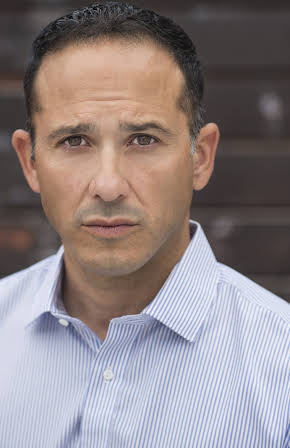 Joe Nieves as 