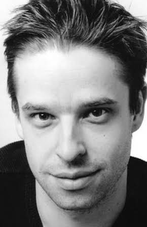 Adam Shaw as Director