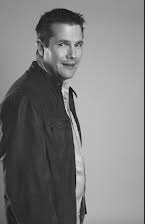 Ashley Edward Miller como Director