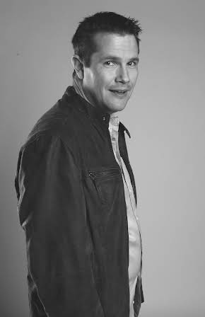 Ashley Edward Miller as Director