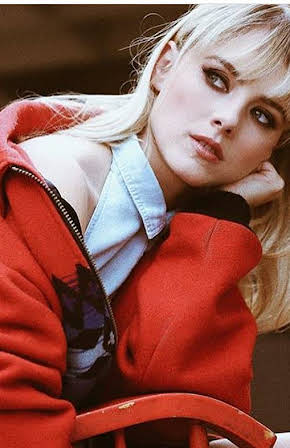 Laura Wiggins as 