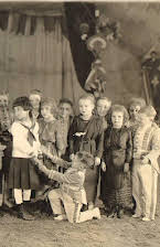 The Singer Midgets as The Munchkins 
  
  
  (as The Munchkins)