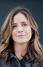 Tracy Droz Tragos as Director