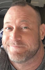 Russell DeGrazier as Director