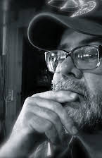 Wilson Coneybeare as Director