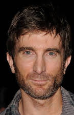 Sharlto Copley as 