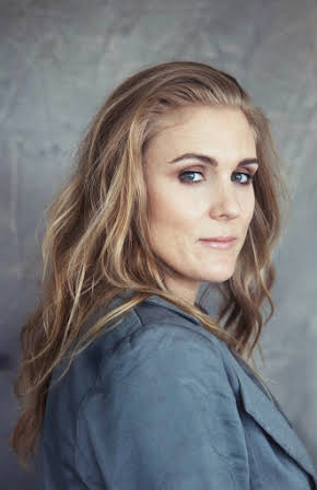 Aidee Walker as Director