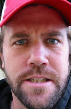 Sam Jones som Director