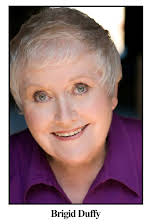 Brigid Duffy as 