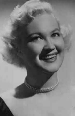 Bibi Osterwald as Neighbor Woman