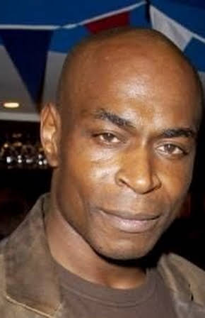 Mark Anthony Brighton as 