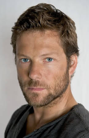 Jamie Bamber as 