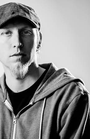 Justin McAleece as Director