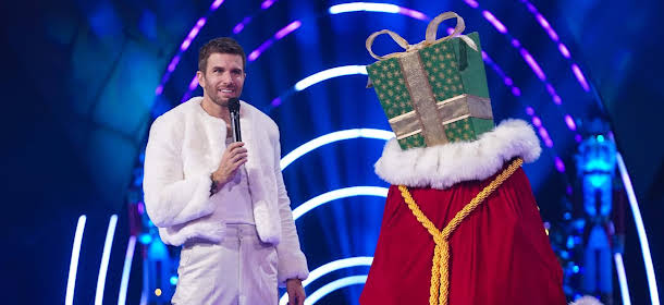 Joel Dommett Throws The Masked Singer Christmas Special Into Chaos After Accidental Celebrity Reveal