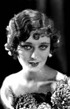 Dolores Costello como Isabel Amberson Minafer