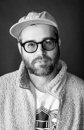 Alex Blagg as Director