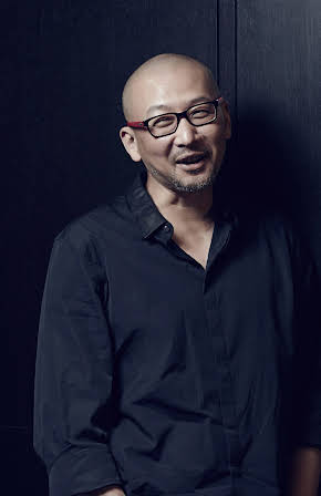 Hu Guan as Director