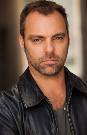 Matthew Holmes as Director