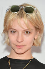 Annabelle Dexter-Jones como L'assistante photographe