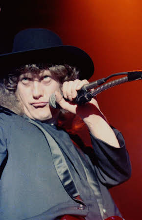 Noddy Holder as 