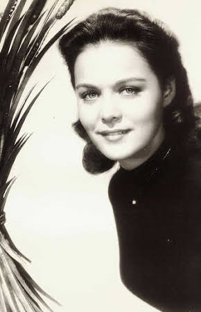 Joan Blackman as Laurie Cutler
