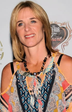 Sylvia Caminer as Director