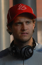 Mitja Okorn as Director