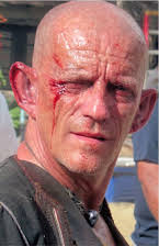 Ezra Buzzington como 